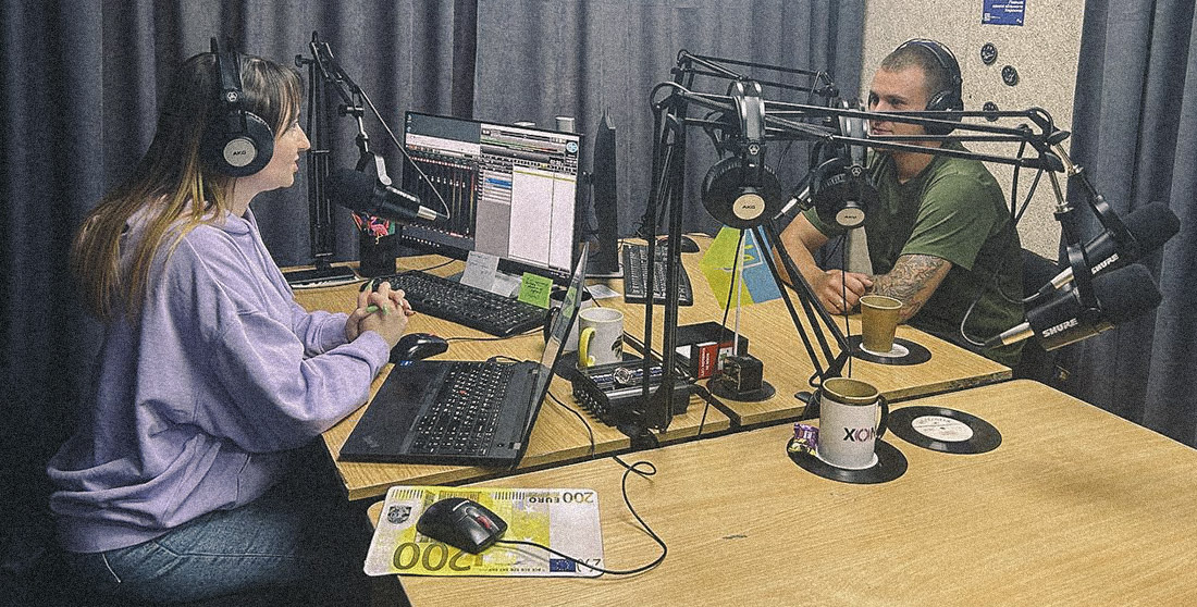 Valentyna with military Serhii of The 35th Separate Marine Brigade on the air